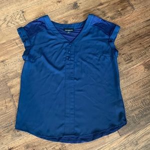 NWOT women’s navy short sleeve blouse. Beautiful and very comfortable!  Size S